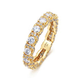 A yellow gold eternity-style ring featuring a continuous row of round clear gemstones, photographed on a clean white background. The inner band is visible and shows the brand name 'mohra'.