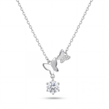 Silver necklace with a bow and round pendant on a white background