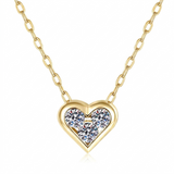 The MOHRA Petite Heart Pendant with three brilliant moissanite in an 18K gold bezel