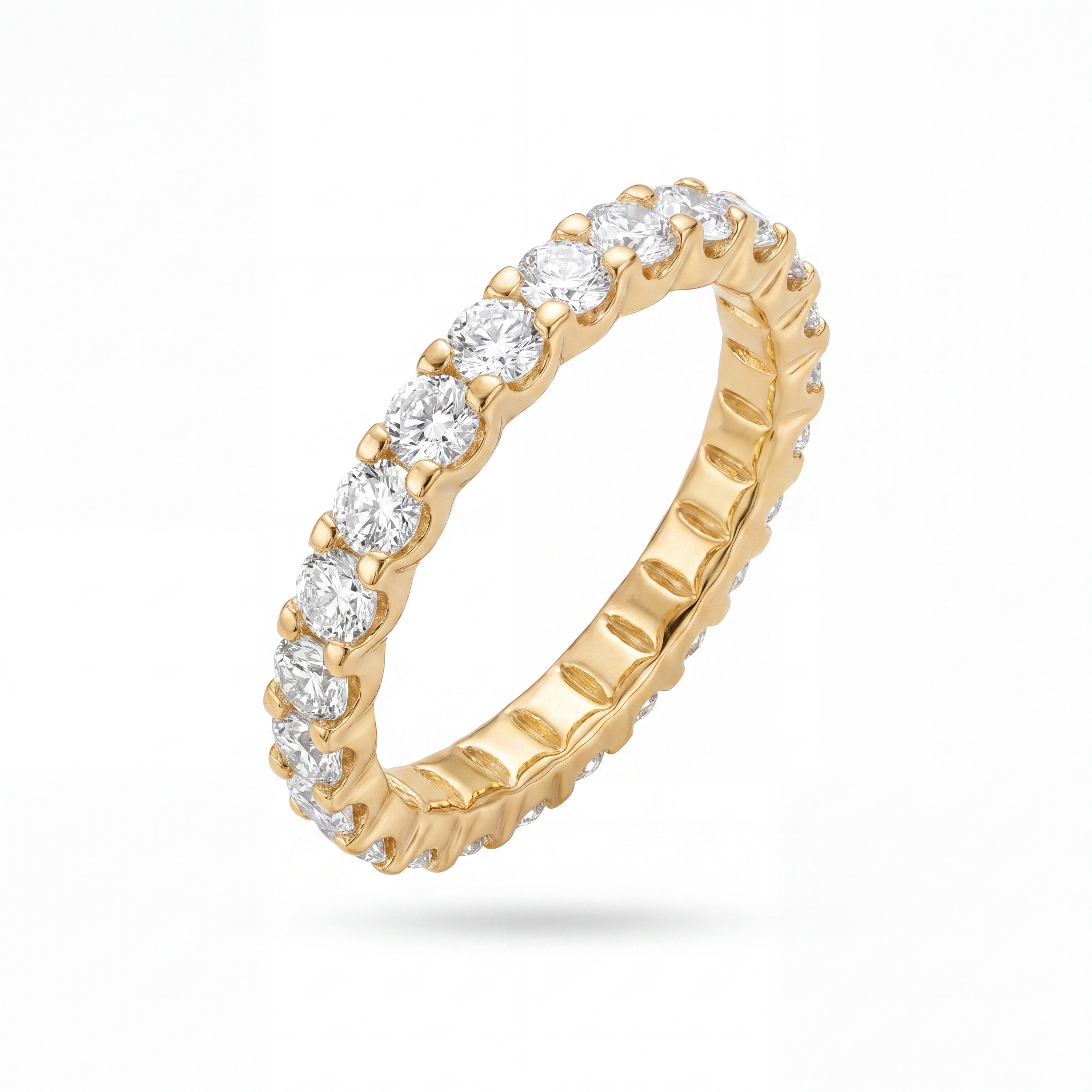 Gold ring with diamonds on a white background