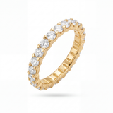 Gold ring with diamonds on a white background