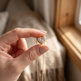 The MOHRA Petite Heart moissanite pendant, dainty gold heart necklace, close detail