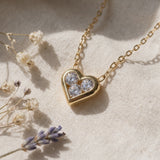 The MOHRA Petite Heart Pendant sparkling in the light