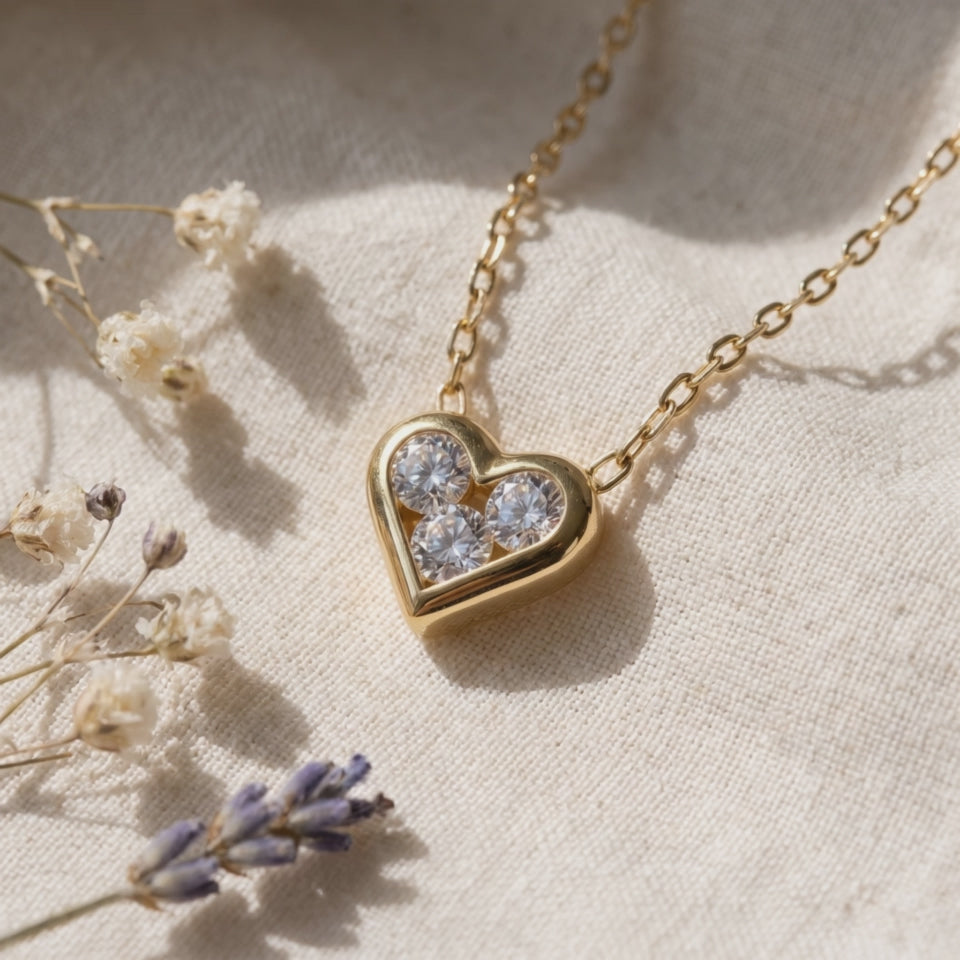 The MOHRA Petite Heart Pendant sparkling in the light