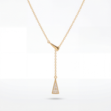 Gold necklace with a triangular pendant on a white background