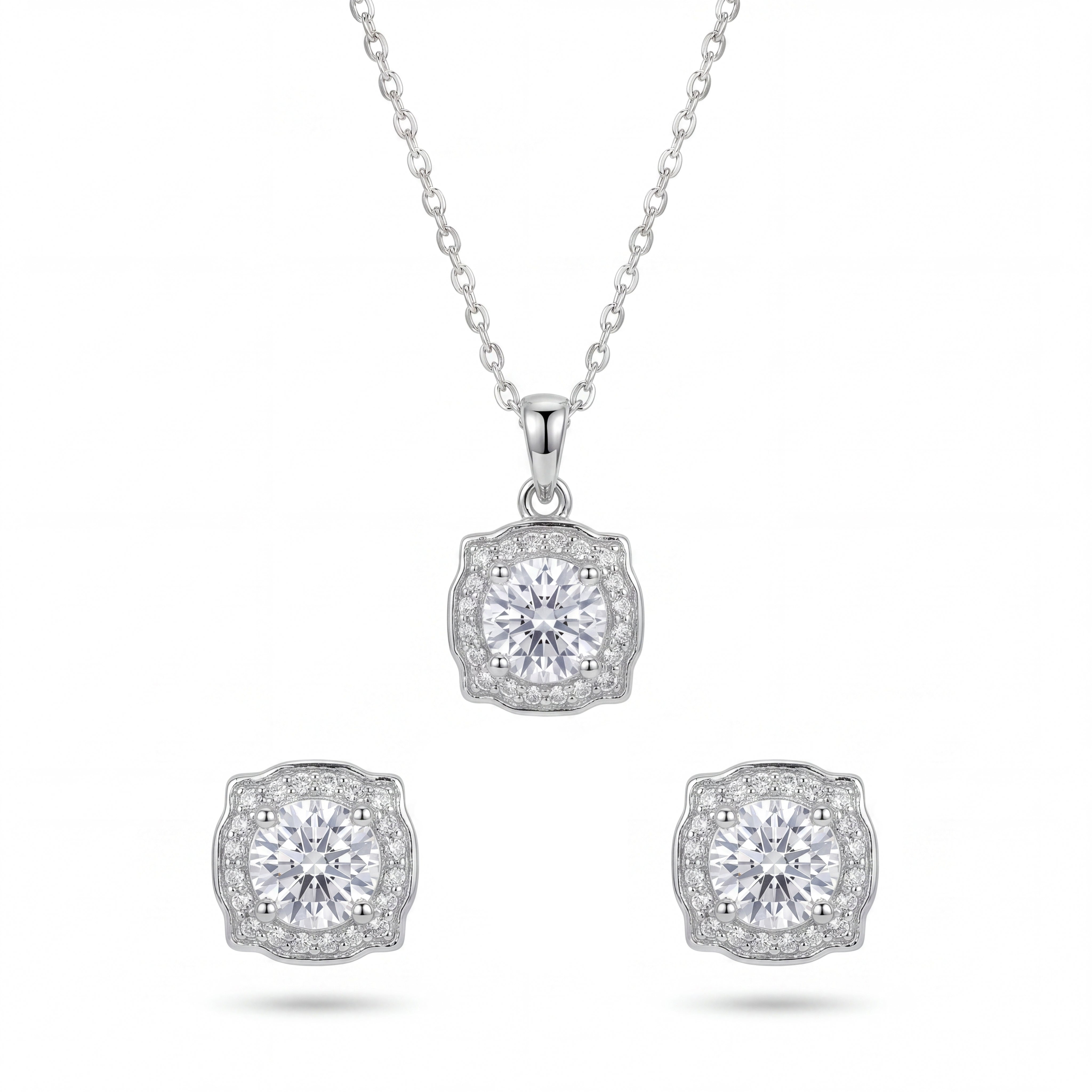 Diamond necklace and earrings set on a white background