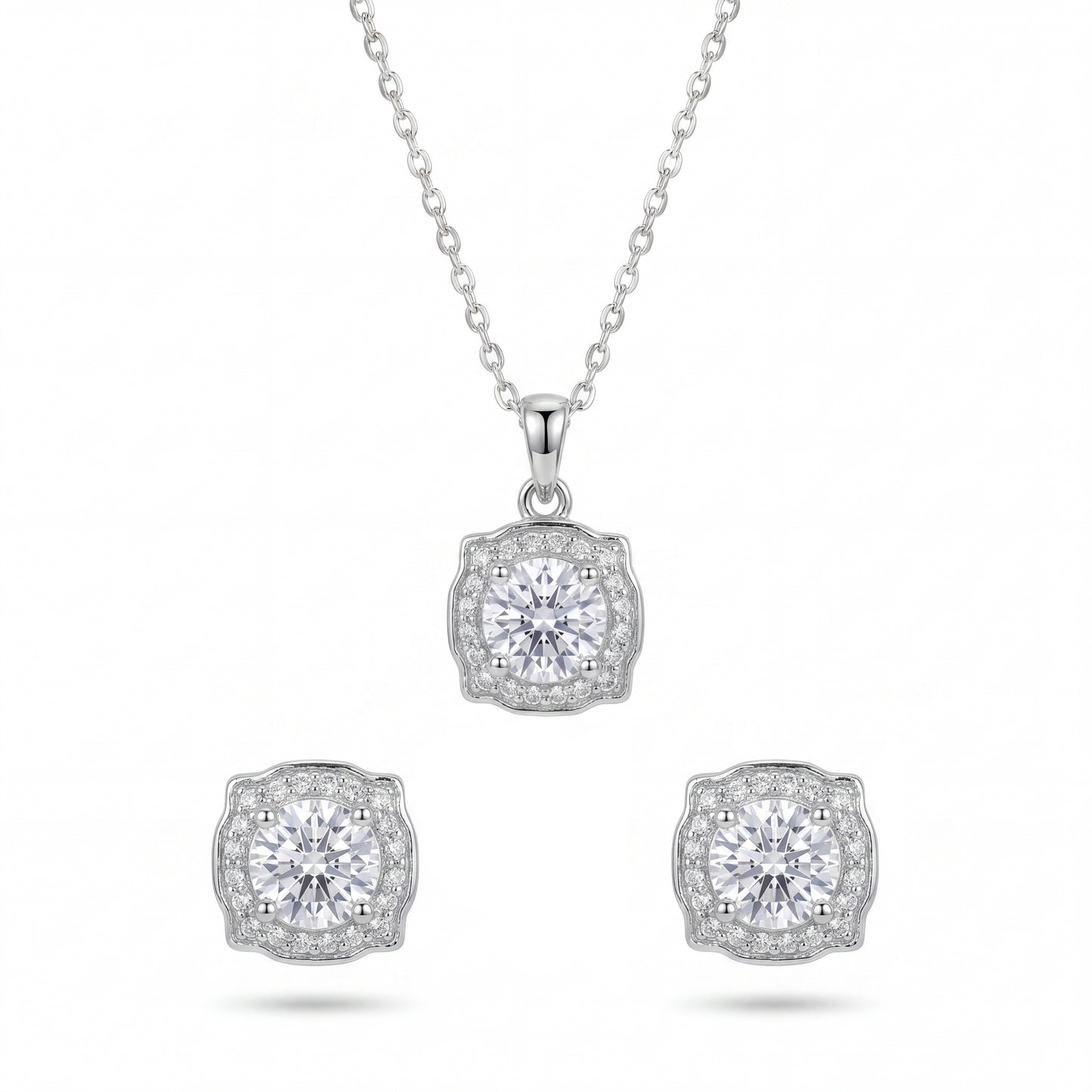 Diamond necklace and earrings set on a white background