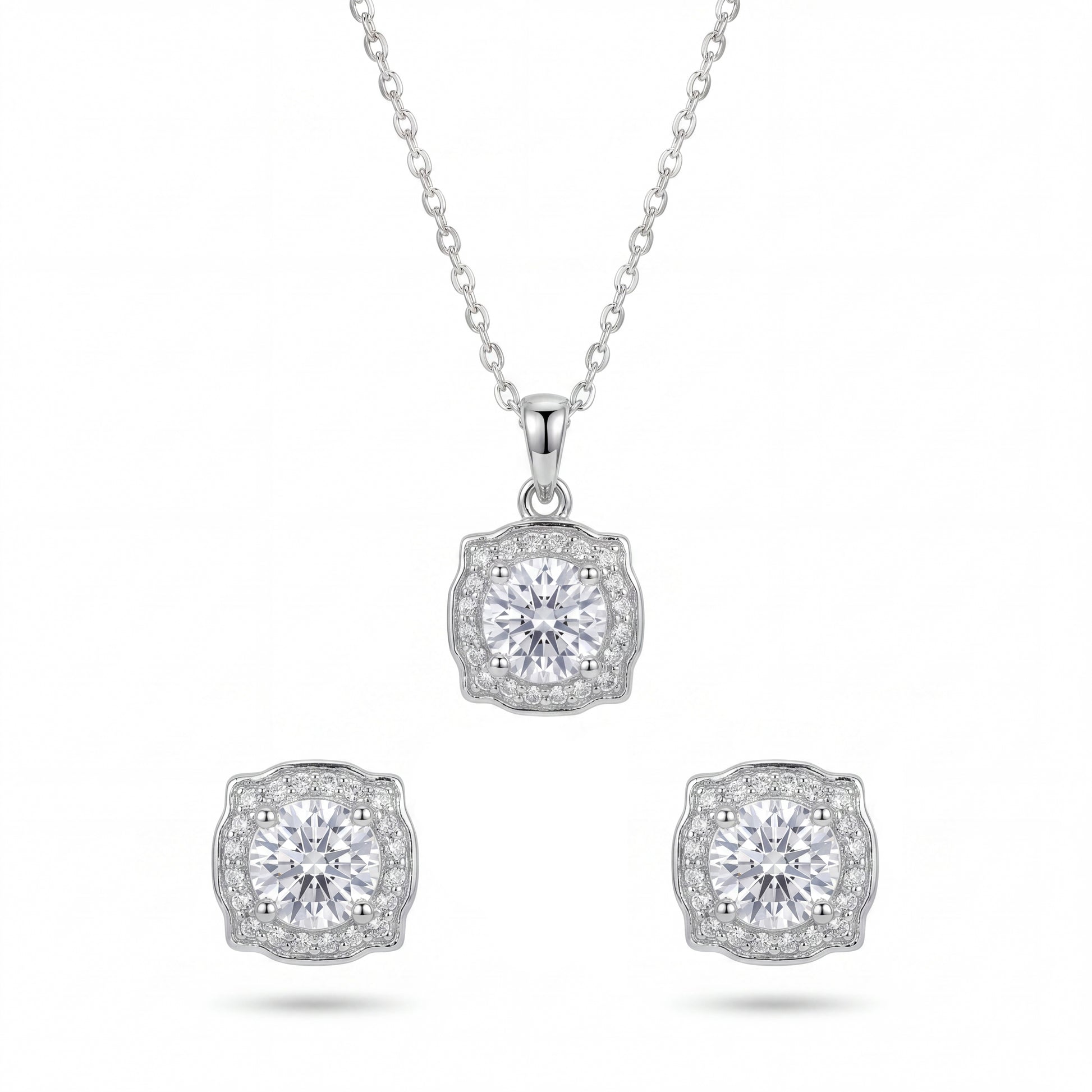 Diamond necklace and earrings set on a white background